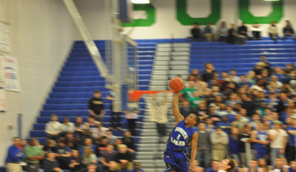 Boys varsity basketball defeats Oakton in tournament final