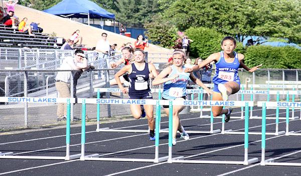 Sophomore Maya Rodriguez wins the 100-meter hurdles during Liberty District Championships. South Lakes hosted the two-day event May 14-15, with the girls claiming first and the boys second.