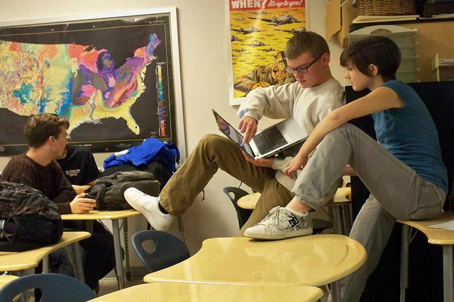 Seniors Jack Nicol and Danielle McLellan conduct research during a Model United Nations meeting last year. Students can learn more about activities such as Model United Nations during a club fair Tuesday. 