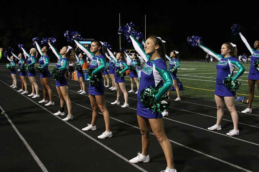 Varsity+cheerleading+performs+at+the+first+home+game+against+Westfield+on+Sept.+6