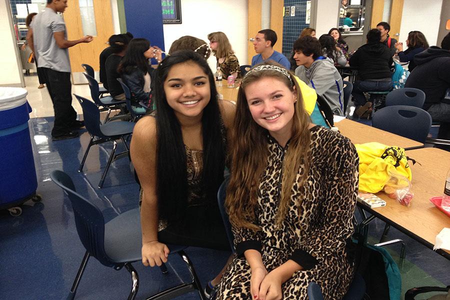 Juniors Sneha Kuchipudi (left) and Alla Cartwright (right) show off their animal costumes during lunch on Safari Day. 