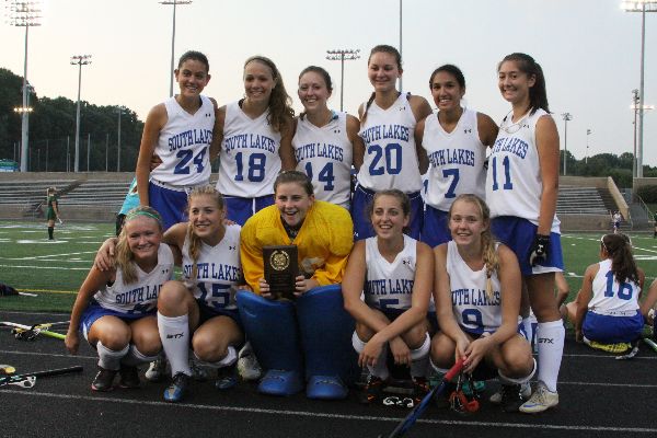 Field hockey seniors pose at the block party in the beginning of the year. 