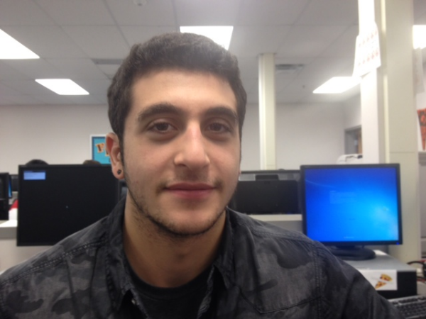 Senior Logan Nasr displays his facial hair on the fourteenth day of No Shave November. 