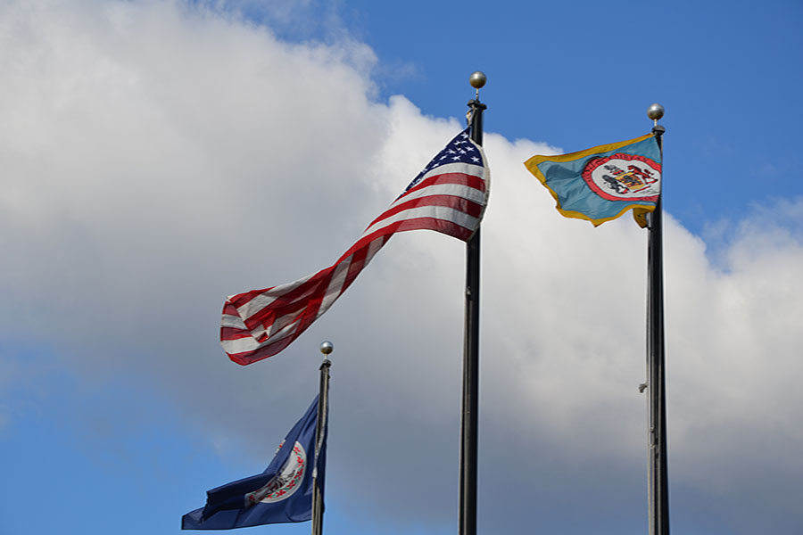 Seahawks honor alumus Naval Commander Halle Dunn in flag raising ceremony