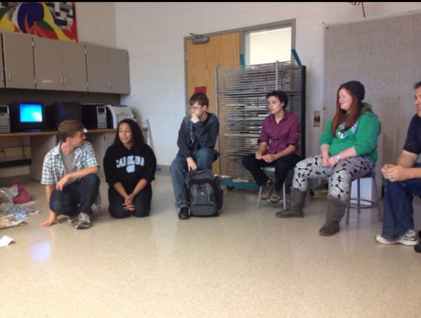Student leaders of Gay Straight Alliance hold a group meeting.