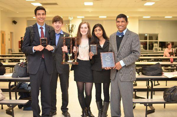 Lincoln-Douglas debaters (from left to right) junior Amar Singh, junior Julian Levy-Myers, senior Grace Erard, junior Sahana Thirumazhusai, and sophomore Kiran Hampton pose with the awards they won at the WACFL Metro Finals tournament held at Dominion High School Feb. 28-March 1. 