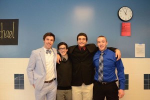 (Left to right) Senior ice hockey players Carter Schultz, Sam Polzin, Logan Nasr, and Joey Owens dressed formally for their rivalry game tonight against Herndon.