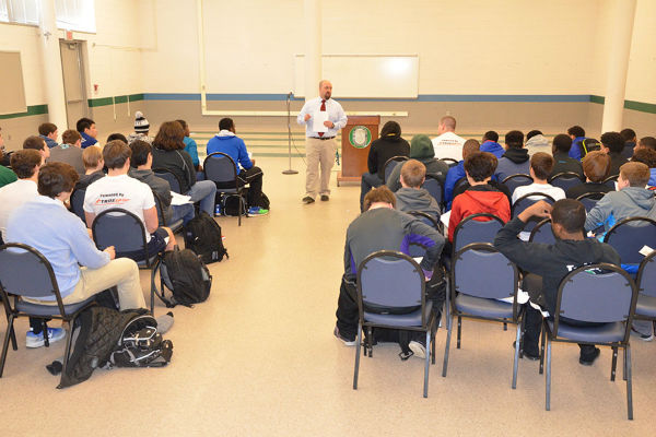 New head football coach Trey Taylor speaks before football players at an introductory meeting March 21. Taylor replaces Marvin Wooten, who stepped down as head of the football program in March to complete the last phase of his Master’s degree.