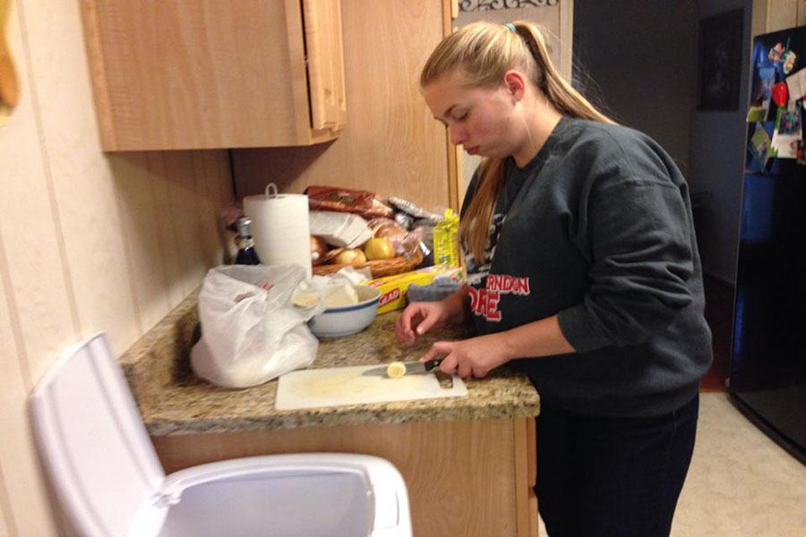 Sophomore Sona Wieczorek bakes banana pudding for the IBMYP project she completed with sophomores Angelica Torres and Richard Torres.