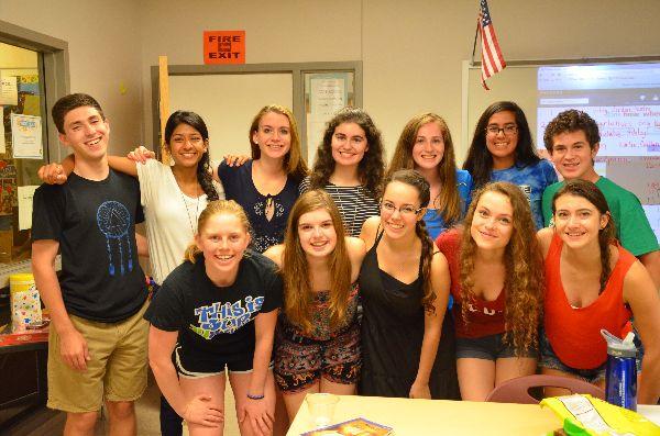 Senior staff members (from left to right) David Freeman, Sachi Jain, Charlotte Smith, Alexa Amster, Gargie Nagarkar, Kevin Gluck, Niki May, Sara Bolanos, Viviana Del Toro, Karolina Bohn, and Jessie Kreson pose in the publication lab. 