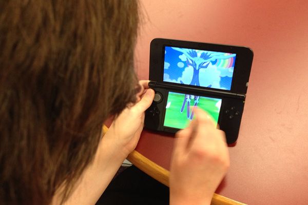 Junior Samantha Sedgwick plays Pokémon X and Y in the Library. The new Pokémon Omega Ruby and Alpha Sapphire will come out in November.