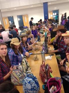 Students are seen dressed up as their respective class cities during lunch.