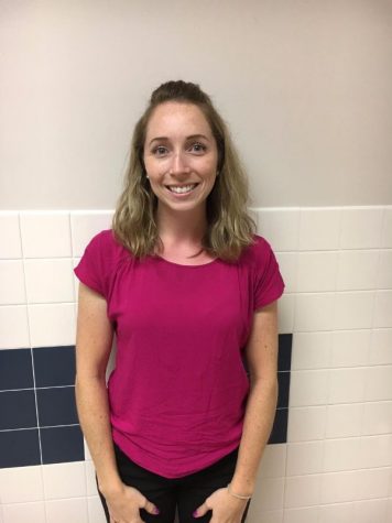 New biology teacher Mrs. Smoot posing in the hallway