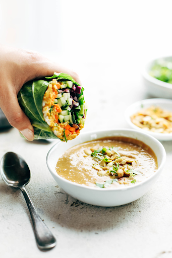 Photo of Veggie Roll-ups, taken from  https://pinchofyum.com/detox-rainbow-roll-ups-peanut-sauce  