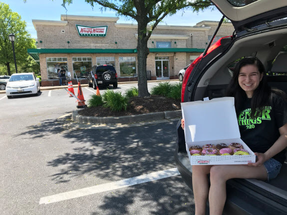 Editor-in-Chief and senior Leana Travis with her "Grad Dozen" doughnuts (courtesy of Leana Travis)