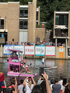 Image via Reddit 
A “Barbie Dreamhouse” boat racing at the 2023 regatta