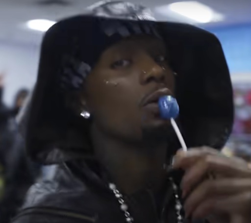 Playboi Carti in a gas station during his music video for the song “2024” 
Image via Youtube