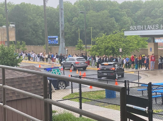 The line leading up to metal detectors at South Lakes High School